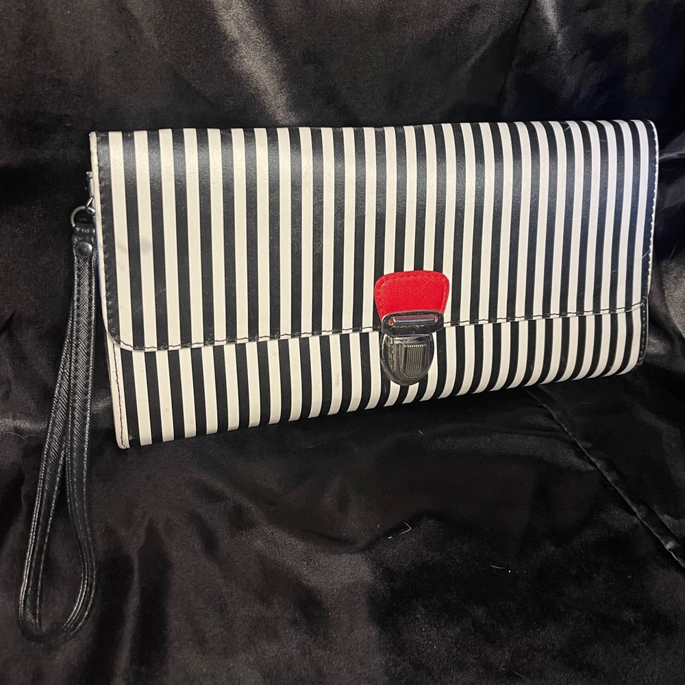 Cute black & white clutch with blue lining